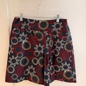 Vuarnet Black A-Line Skort with Red, Cream & Yellow Circular Print